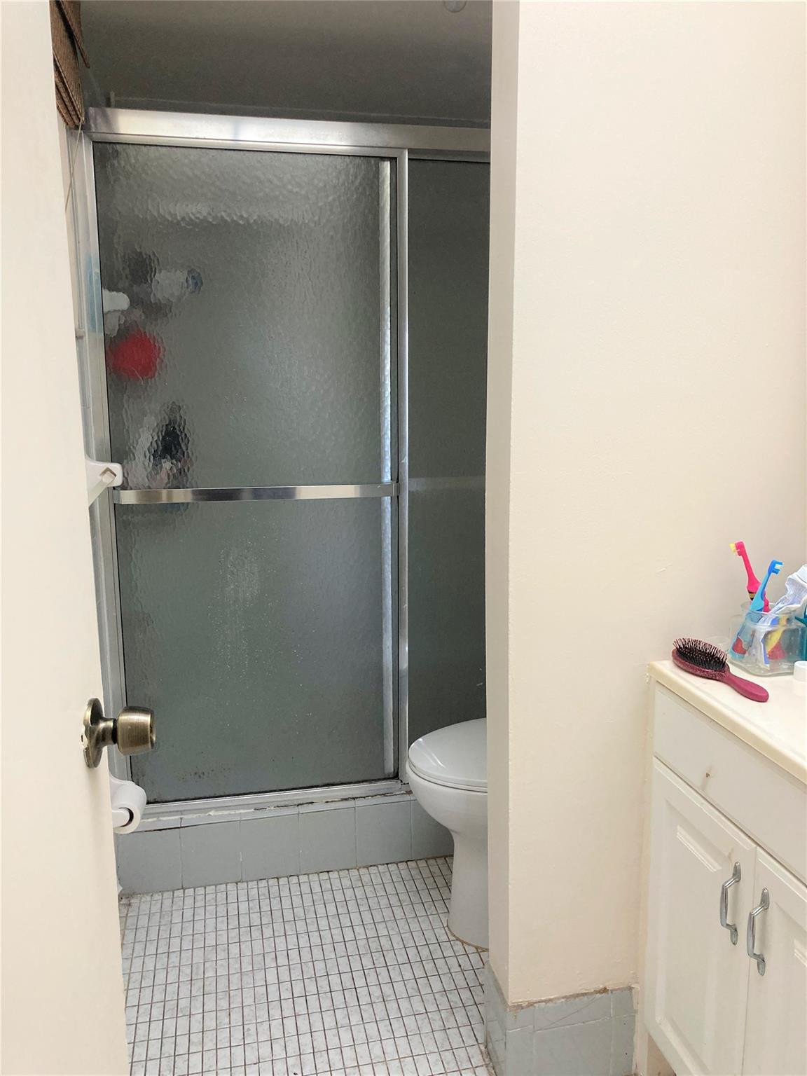 469 North Pine Island Road, Unit 308B Plantation, FL 33324 - Photo 6 of 16 a bathroom with a sink and a shower