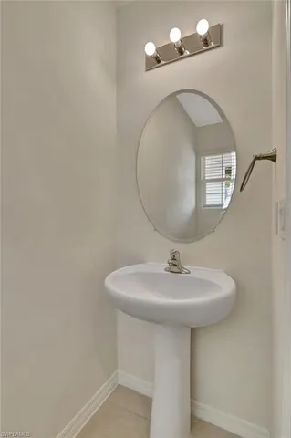 a view of a livingroom with furniture and a window