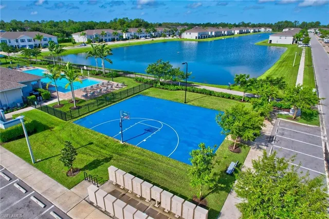 an aerial view of a houses with a garden