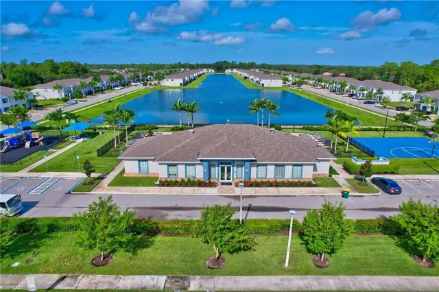 an aerial view of a houses with outdoor space