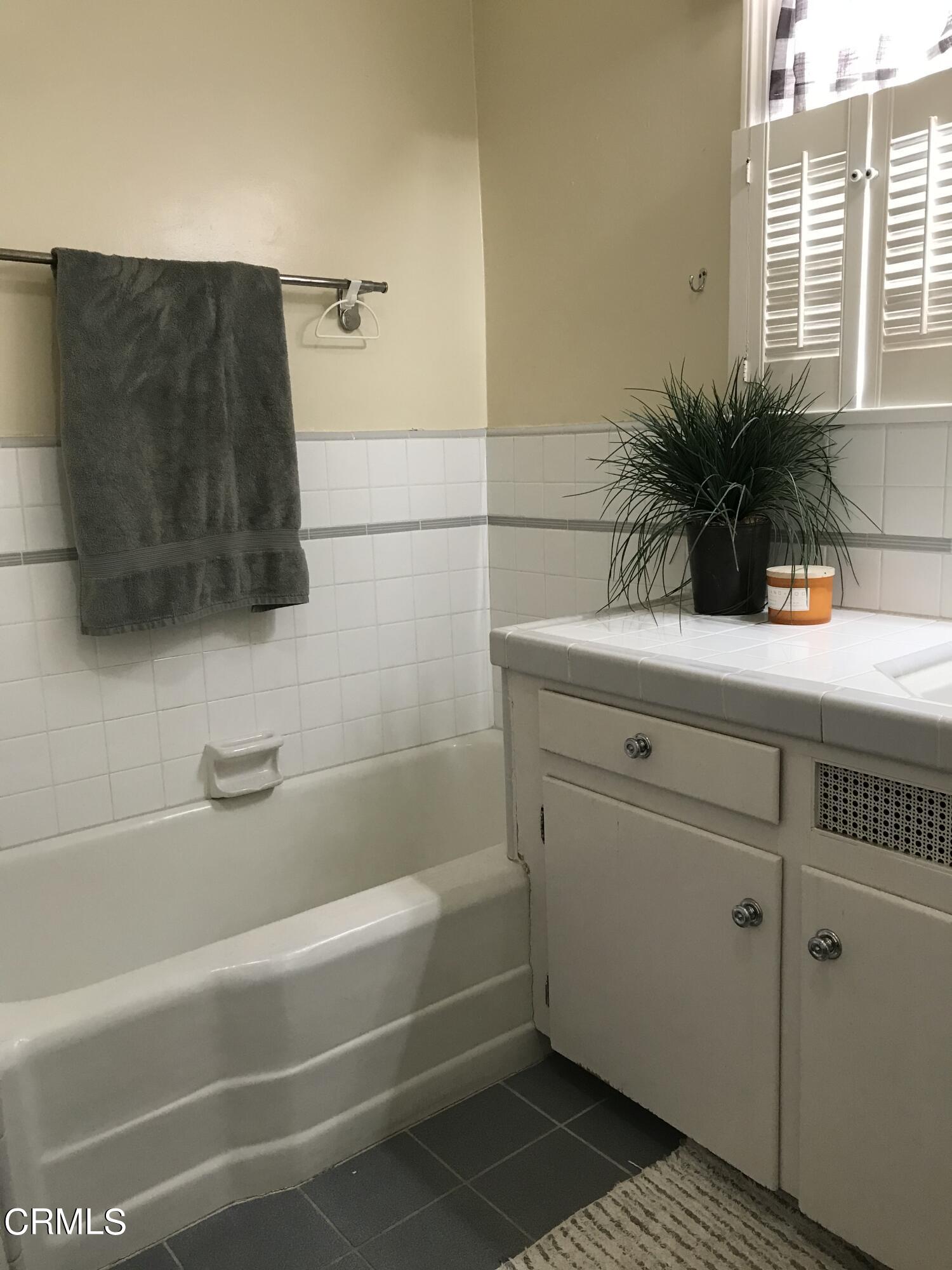 952 Balboa Drive Arcadia, CA 91007 - Photo 9 of 13 a bathroom with a bathtub and a shower