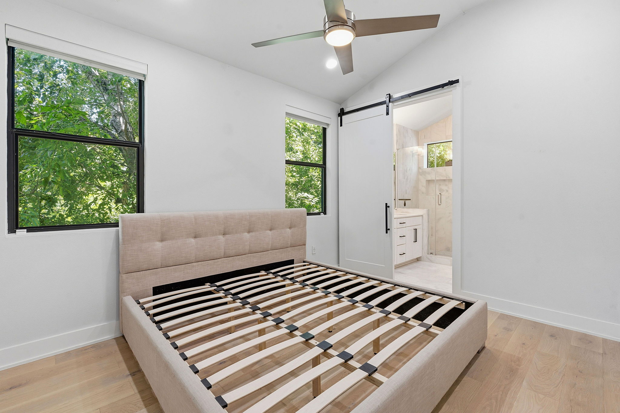 2935 Moss Street, Unit 2 Austin, TX 78722 - Photo 7 of 20 Primary bedroom pictured with a king sized bed