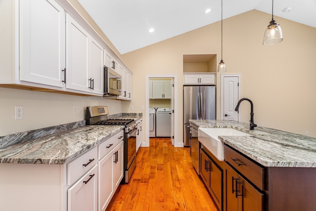 66 New Salem Road Petersham, MA 01366 - Photo 11 of 28 a kitchen with stainless steel appliances granite countertop a stove and a sink