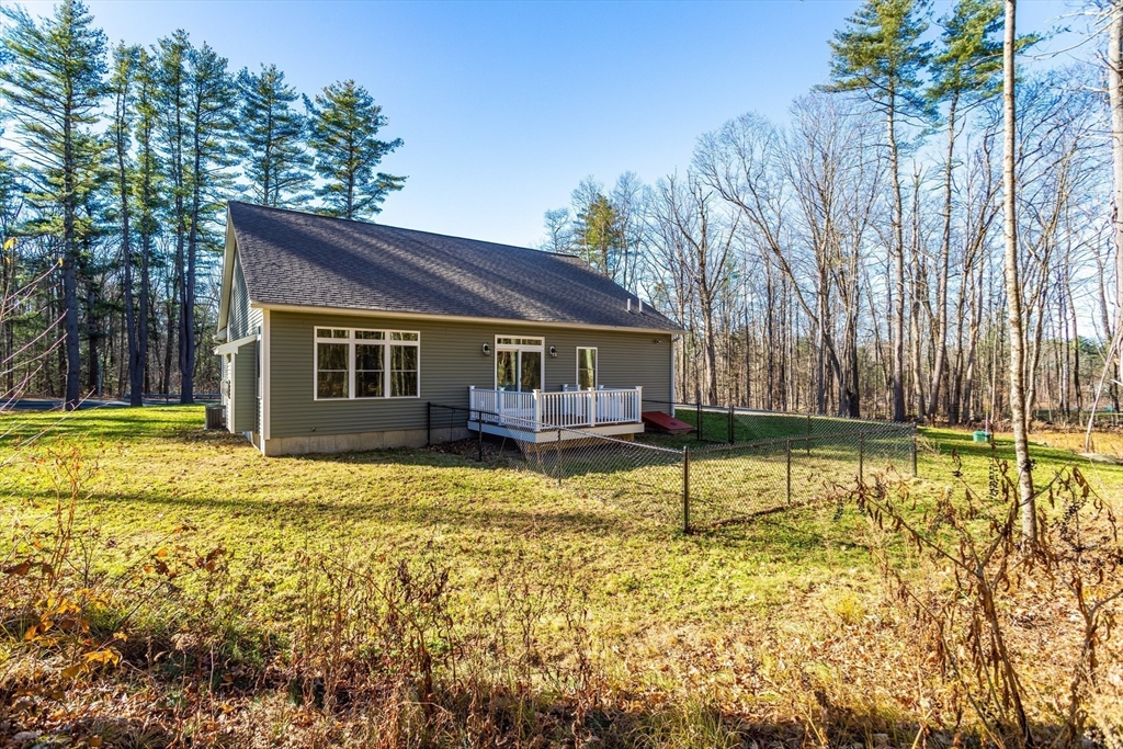 66 New Salem Road Petersham, MA 01366 - Photo 27 of 28 a view of a house with swimming pool and a yard