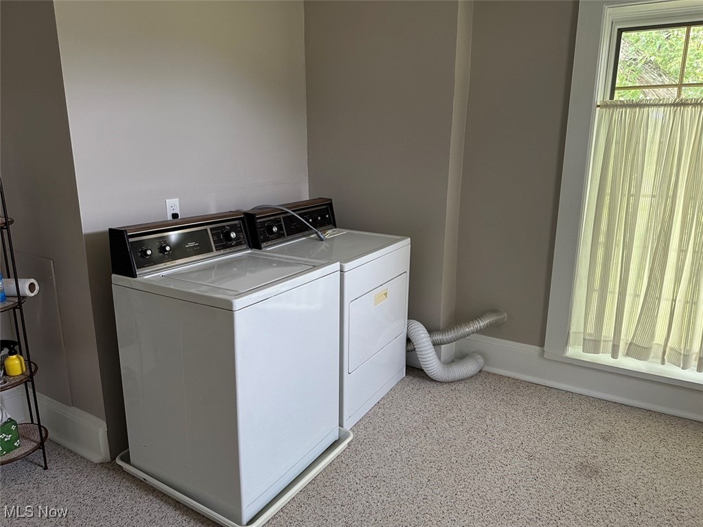 1241 Apollo Road Southeast Carrollton, OH 44615 - Photo 27 of 33 Clothes washing area featuring light carpet and washer and dryer