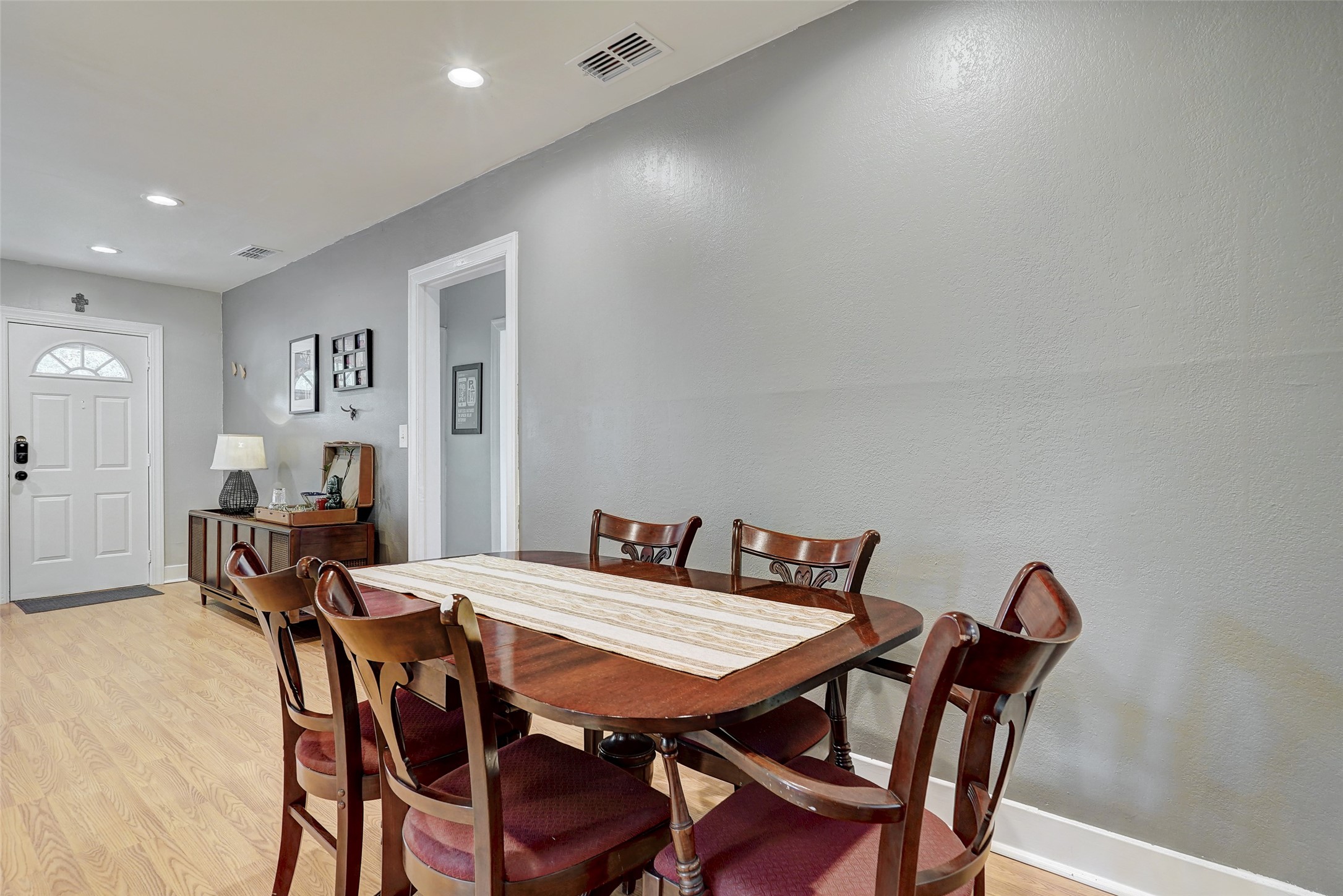 5204 Huisache Street, Unit 1 Austin, TX 78751 - Photo 13 of 24 dining room between living and kitchen