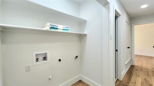 a view of a hallway with closet