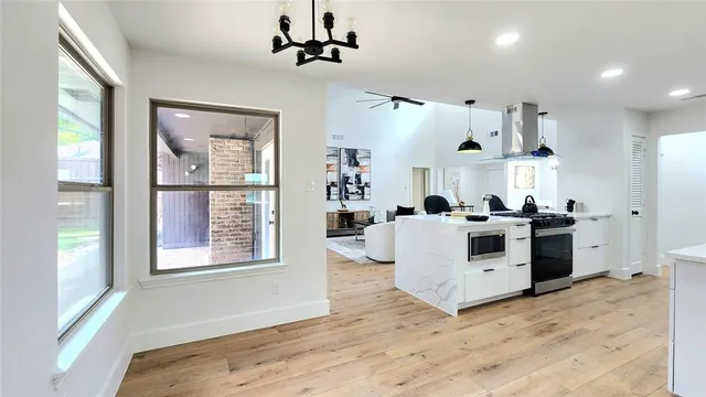 a view of living room with furniture and window