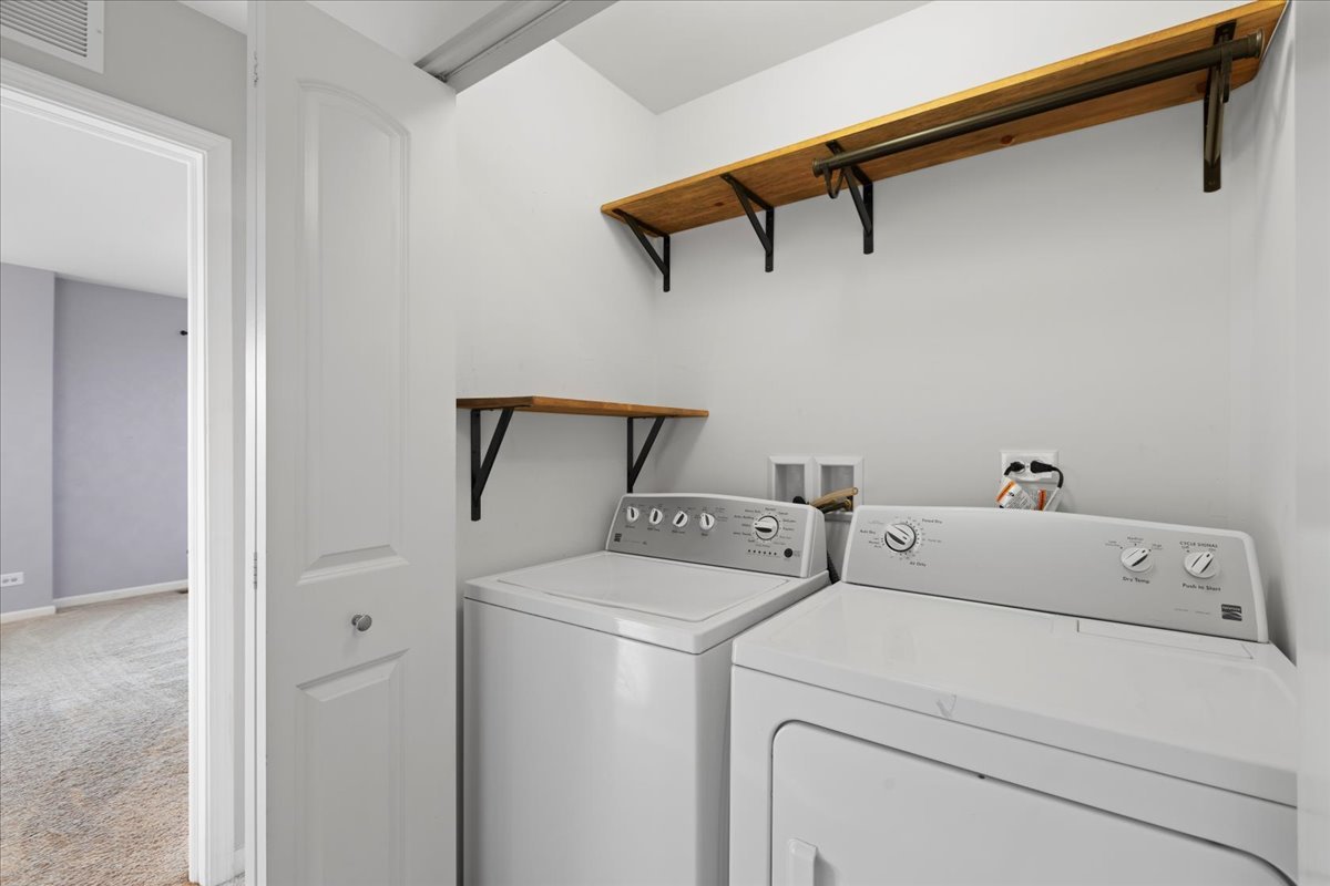 1092 Sapphire Lane Pingree Grove, IL 60140 - Photo 15 of 21 a view of storage and utility room with washer and dryer