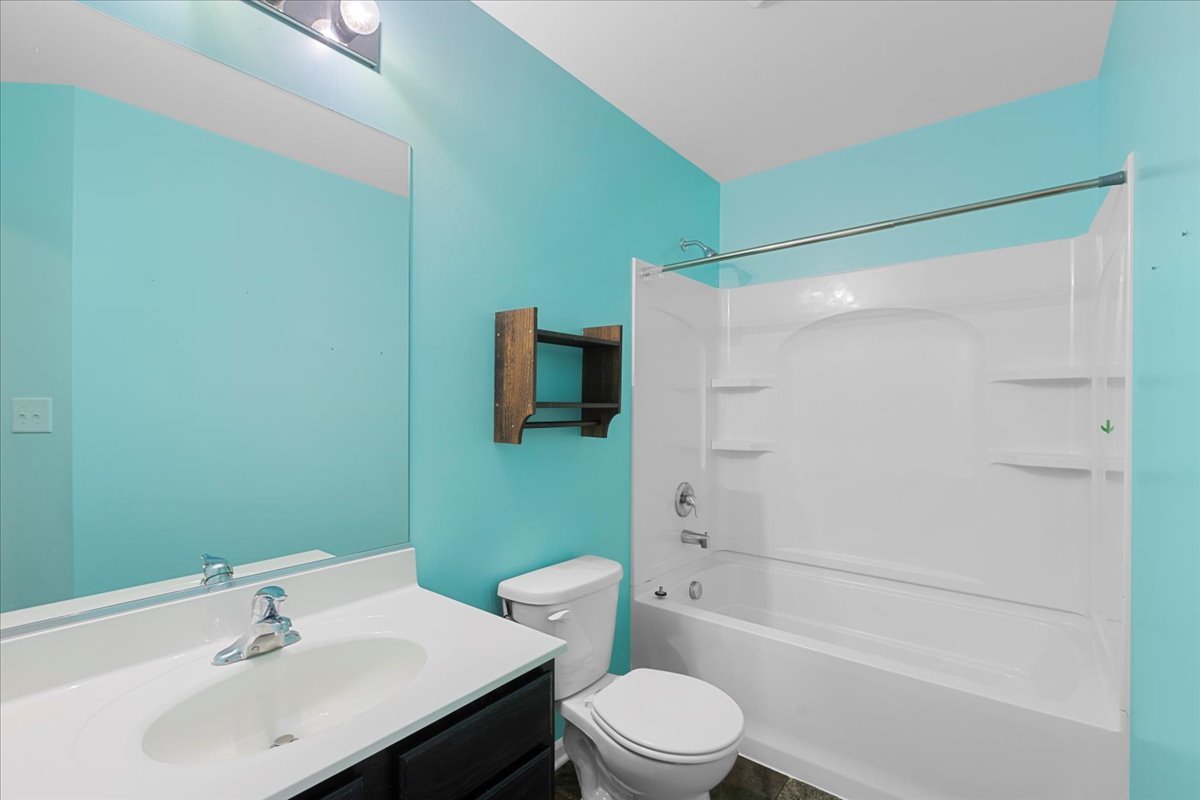 1092 Sapphire Lane Pingree Grove, IL 60140 - Photo 5 of 21 a bathroom with a sink toilet and shower