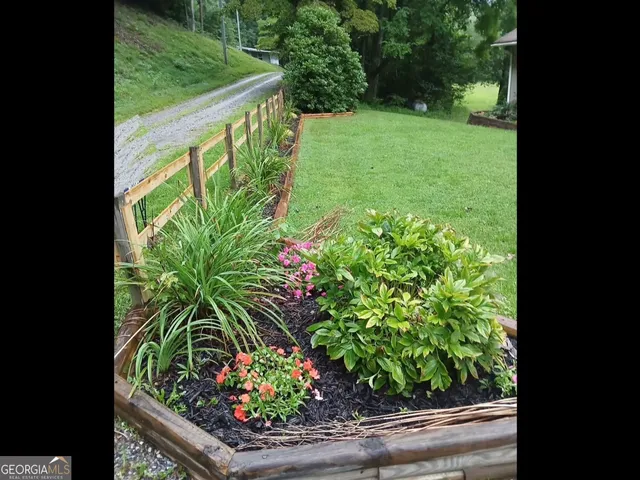 a view of a balcony with wooden floor