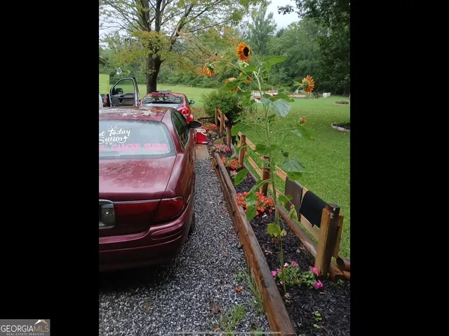 a view of an chairs and table in the balcony