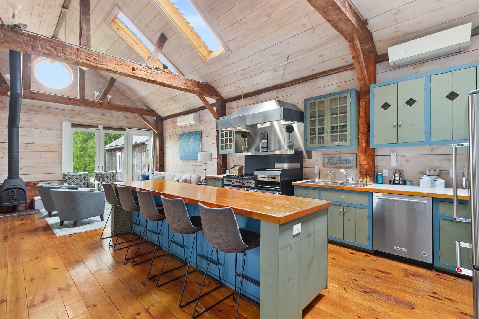 7 Town Line Road Wainscott, NY 11975 - Photo 9 of 17 a large kitchen with lots of counter space and stainless steel appliances