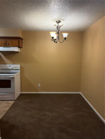 a view of a livingroom with a fireplace
