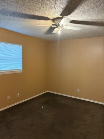 a view of a room with an empty space