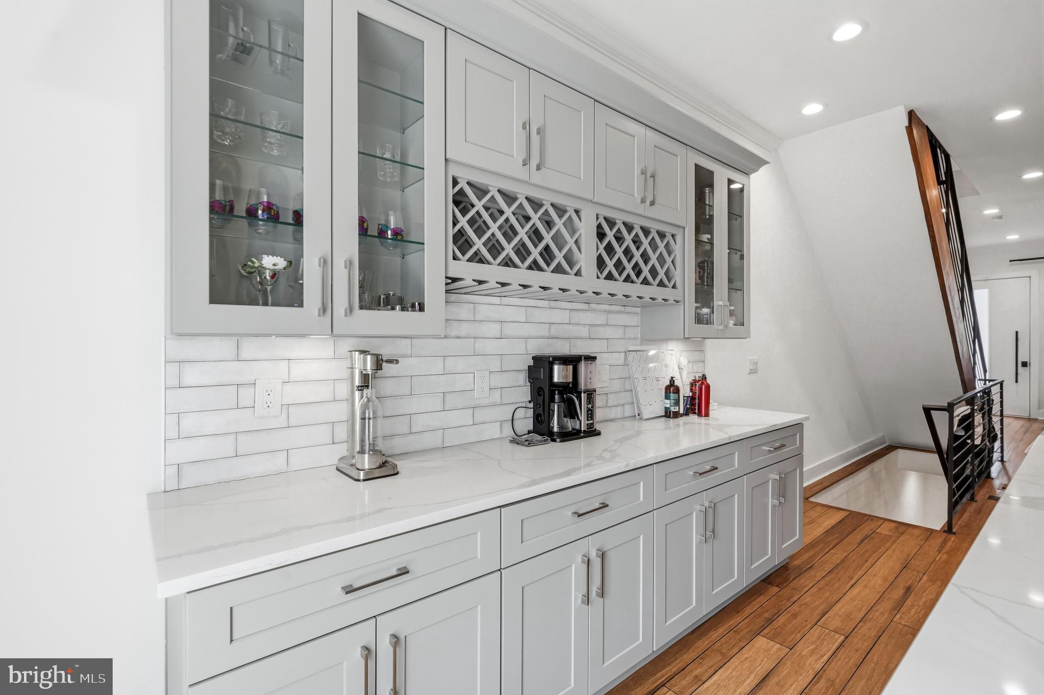 2604 Reed Street Philadelphia, PA 19146 - Photo 7 of 45 a kitchen with cabinets and window