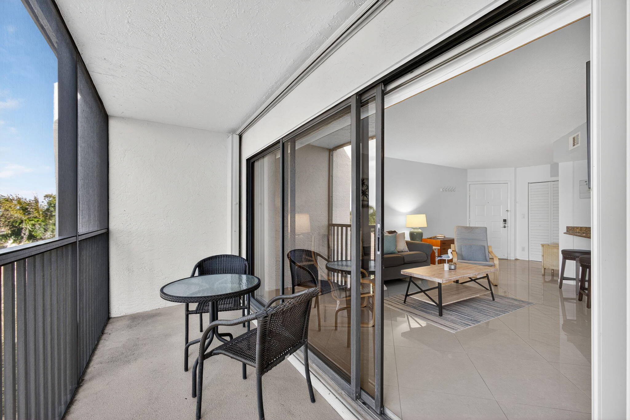 1605 Highway 1, Unit A407 Jupiter, FL 33477 - Photo 14 of 44 Screened Balcony