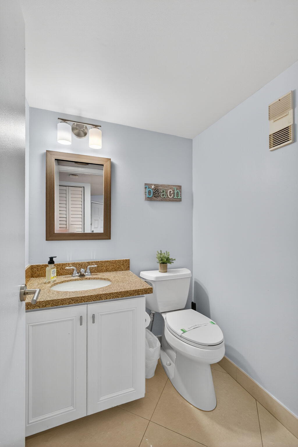 1605 Highway 1, Unit A407 Jupiter, FL 33477 - Photo 24 of 44 Half Bathroom
