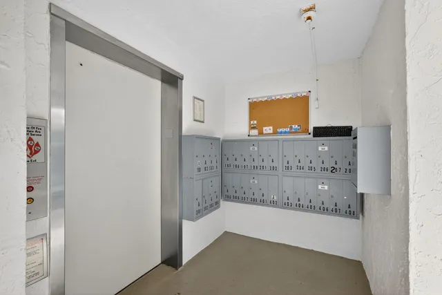 a view of a dining room and livingroom with furniture window and outside view