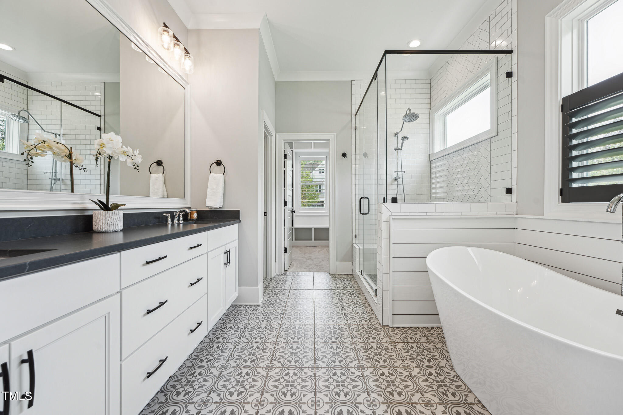 3545 Donlin Drive Wake Forest, NC 27587 - Photo 29 of 62 a spacious bathroom with a tub sink shower and mirror