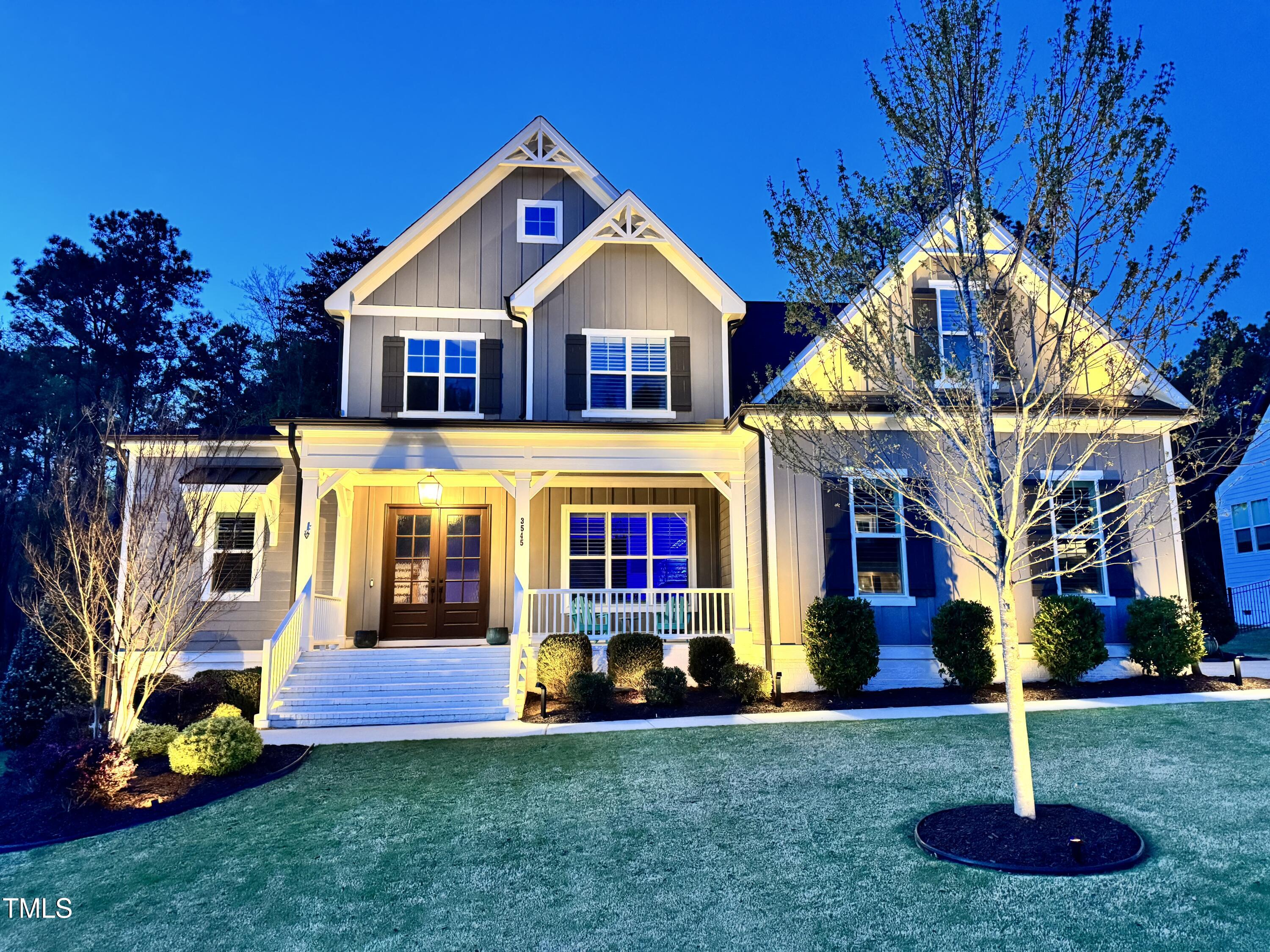 3545 Donlin Drive Wake Forest, NC 27587 - Photo 3 of 62 a front view of a house with garden