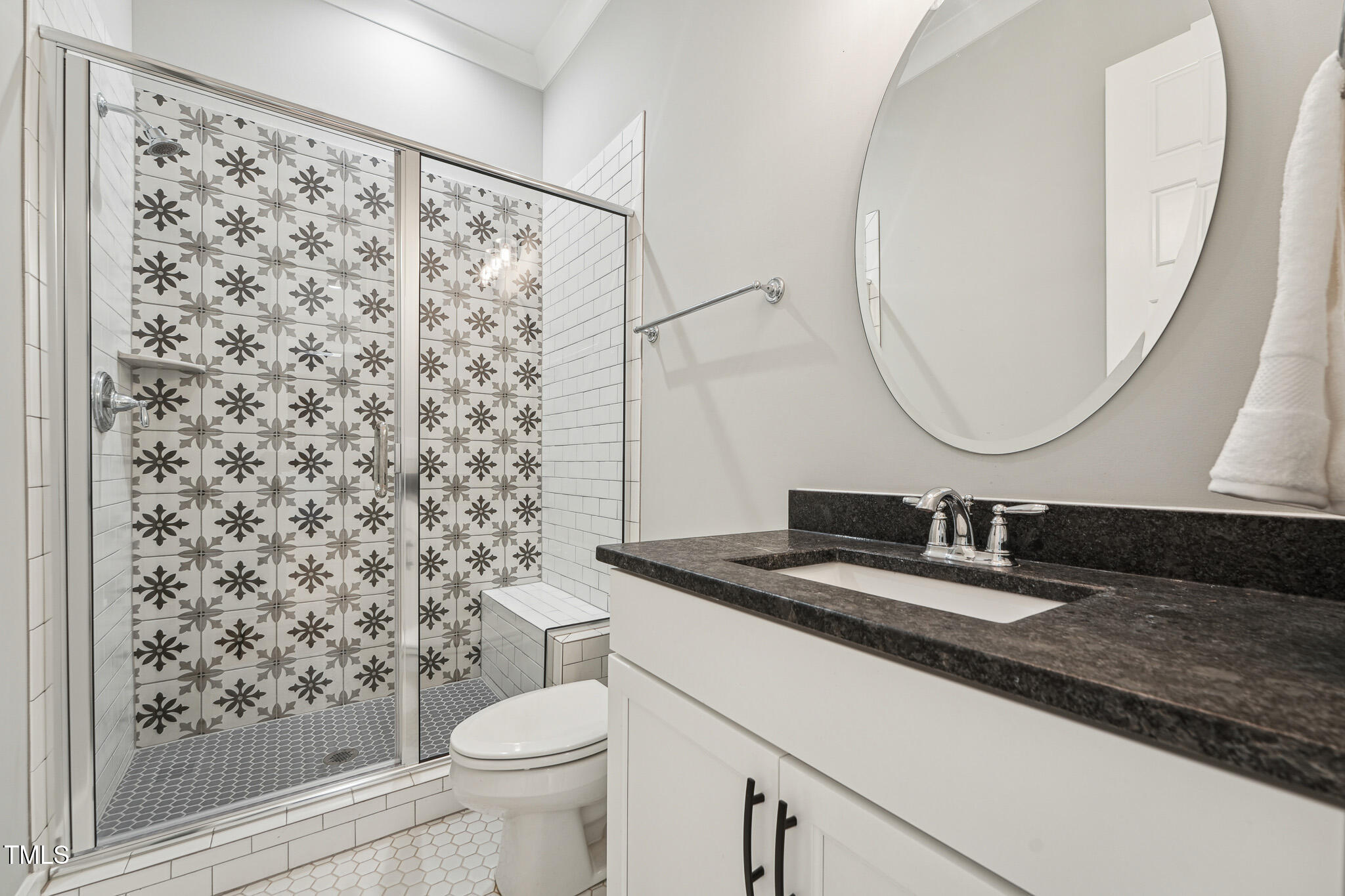 3545 Donlin Drive Wake Forest, NC 27587 - Photo 35 of 62 a bathroom with a granite countertop sink toilet and a mirror