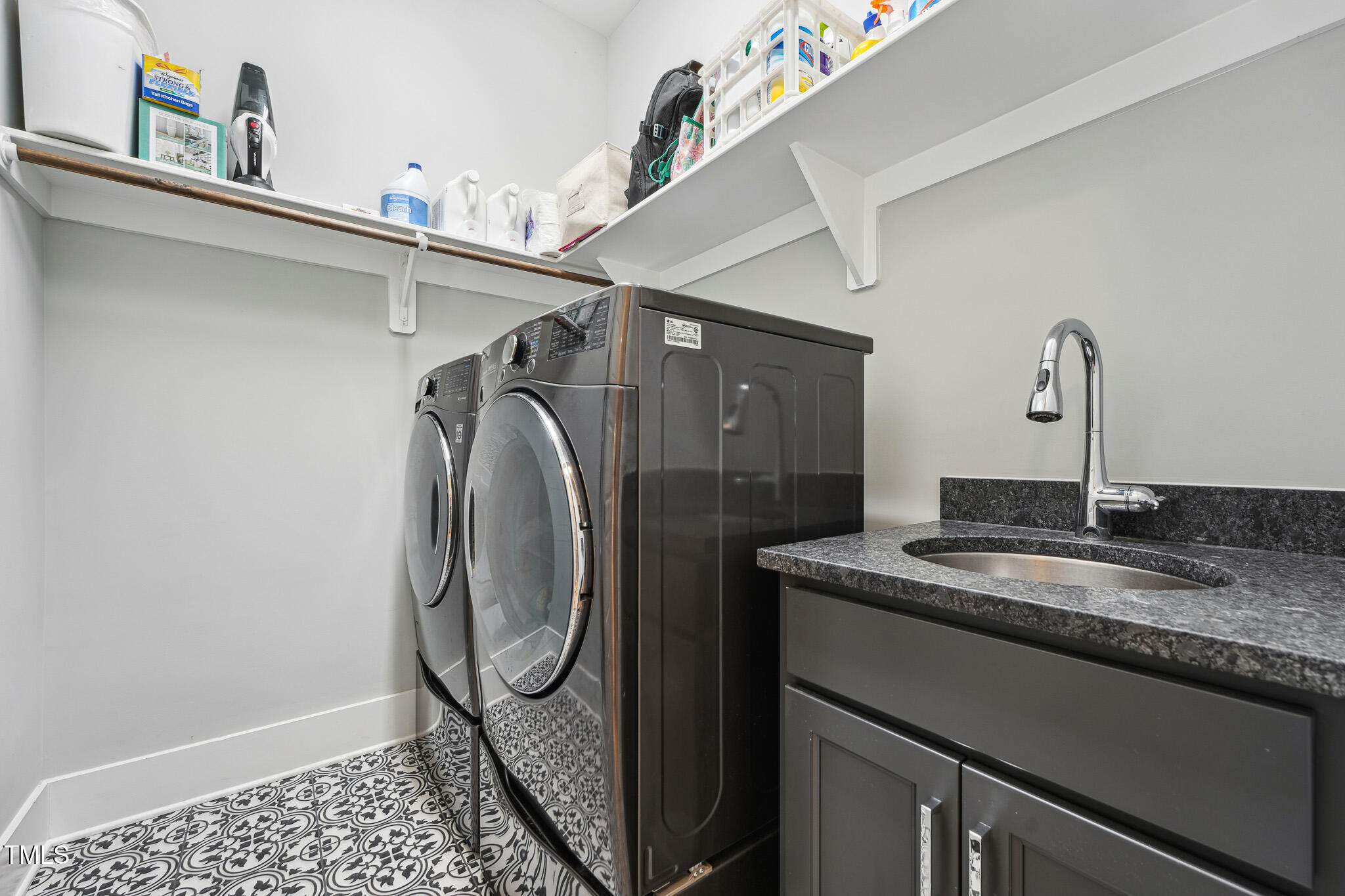 3545 Donlin Drive Wake Forest, NC 27587 - Photo 36 of 62 a bathroom with a sink a mirror and vanity