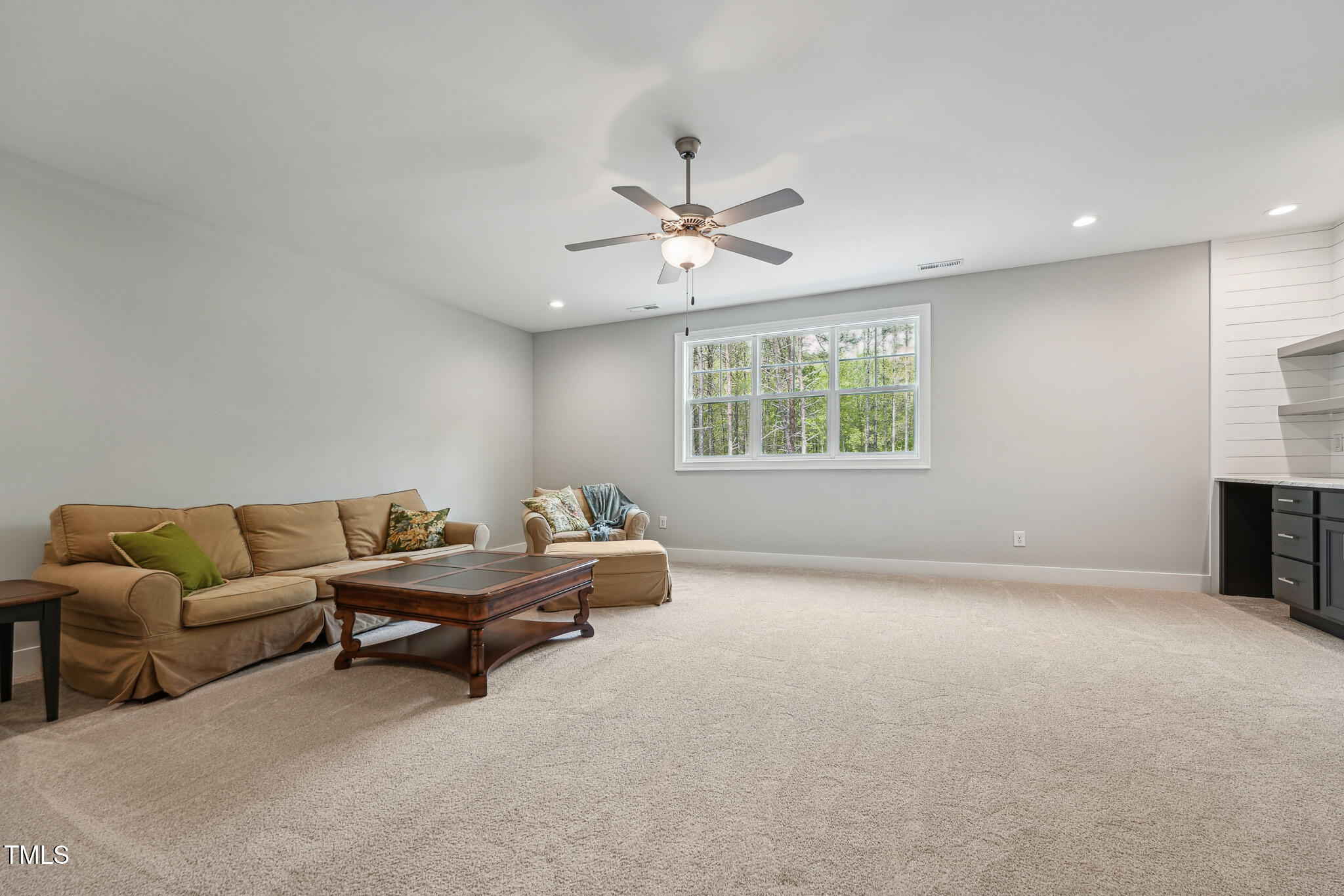 3545 Donlin Drive Wake Forest, NC 27587 - Photo 39 of 62 a living room with furniture and a ceiling fan