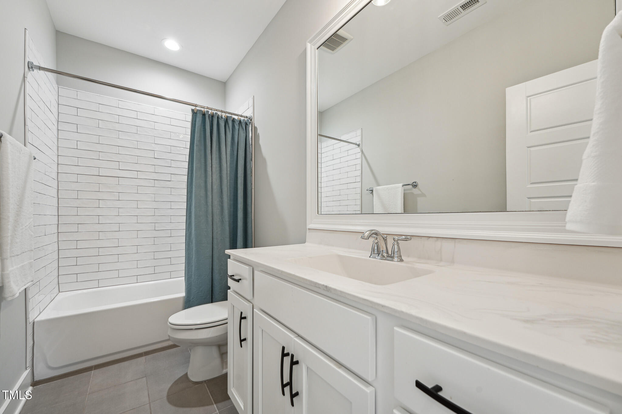 3545 Donlin Drive Wake Forest, NC 27587 - Photo 42 of 62 a bathroom with a sink toilet and shower