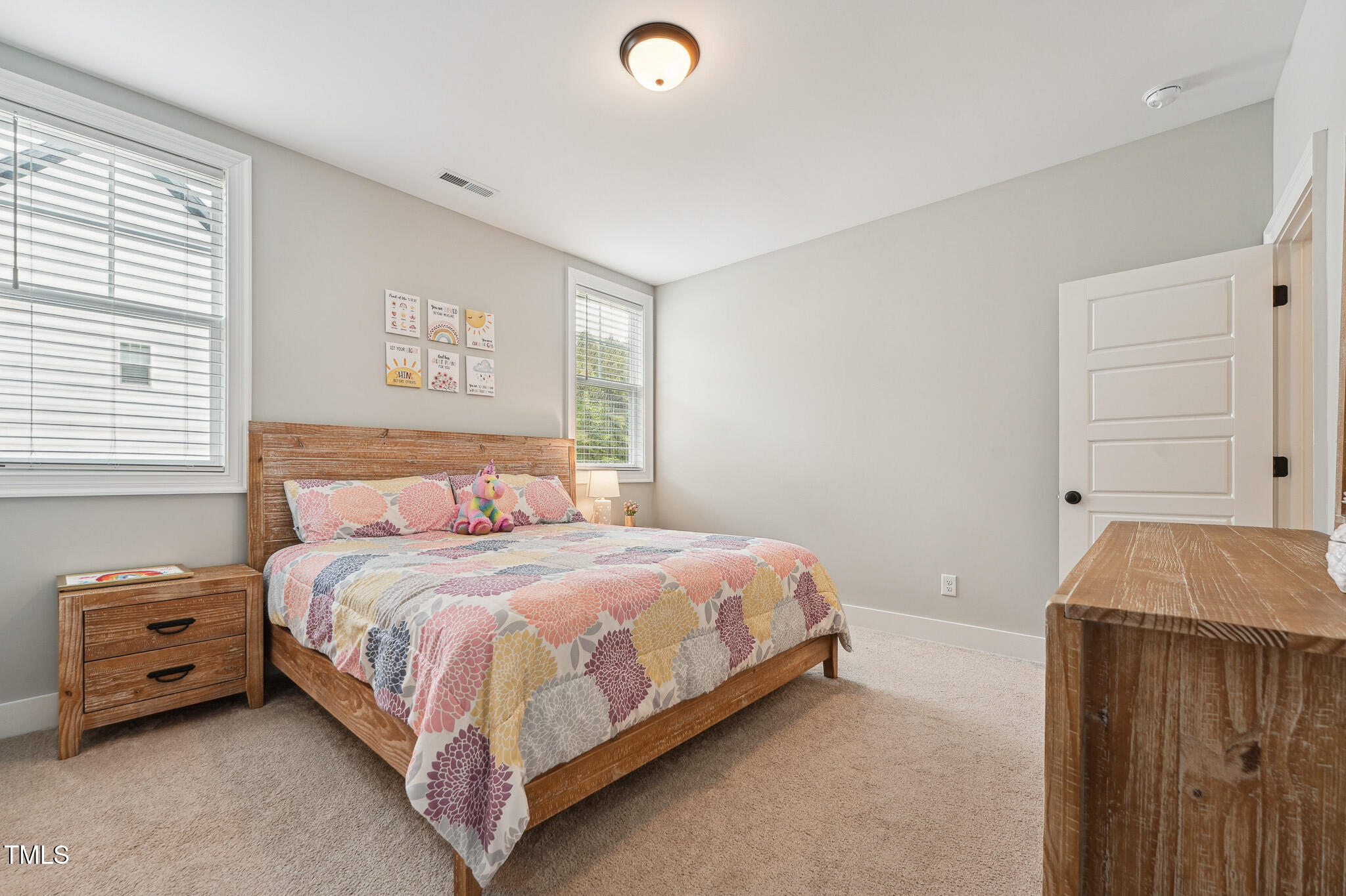 3545 Donlin Drive Wake Forest, NC 27587 - Photo 44 of 62 a bedroom with a bed and a window