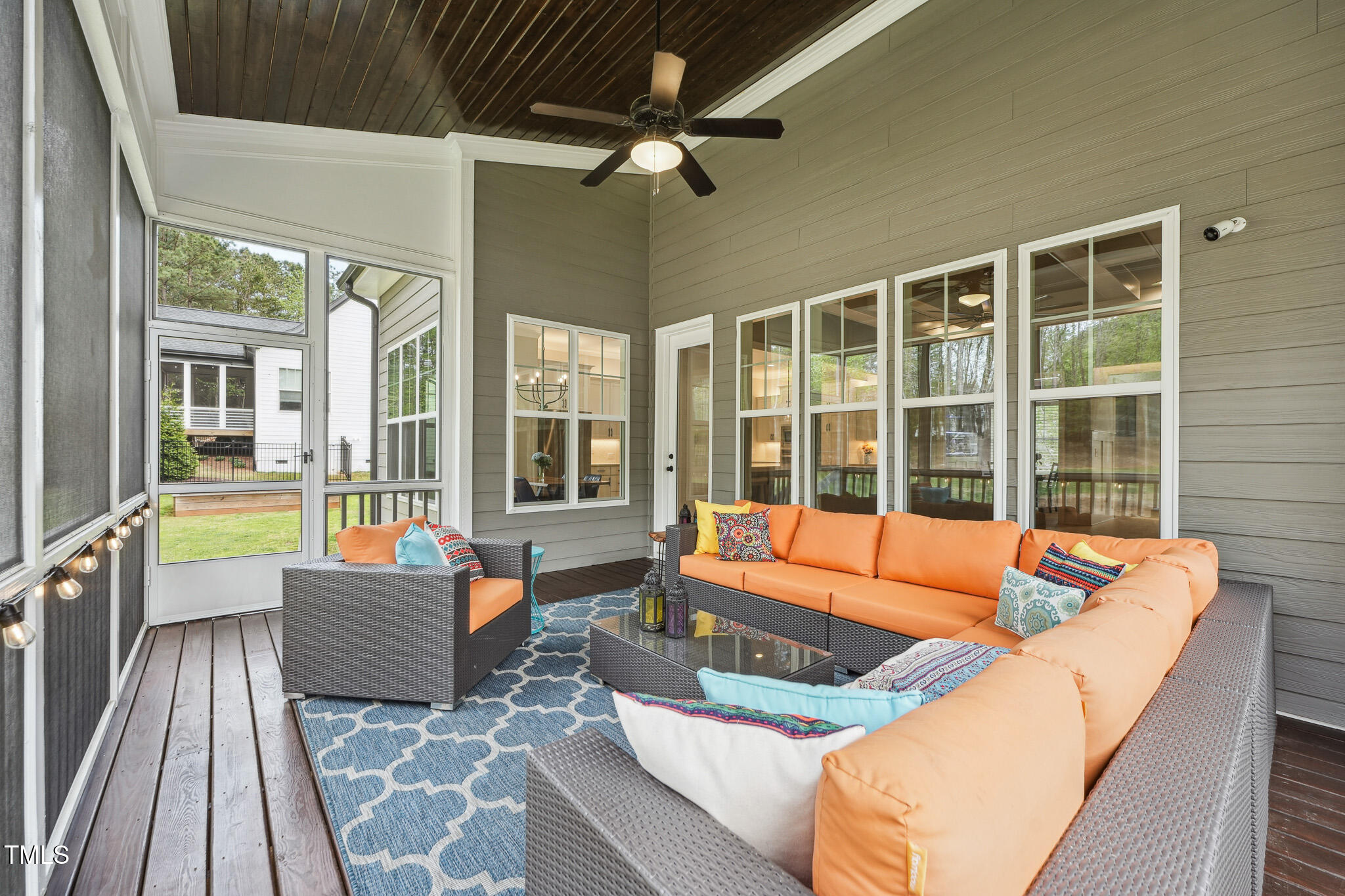 3545 Donlin Drive Wake Forest, NC 27587 - Photo 54 of 62 a outdoor space with patio the couches and dining table with a barbeque