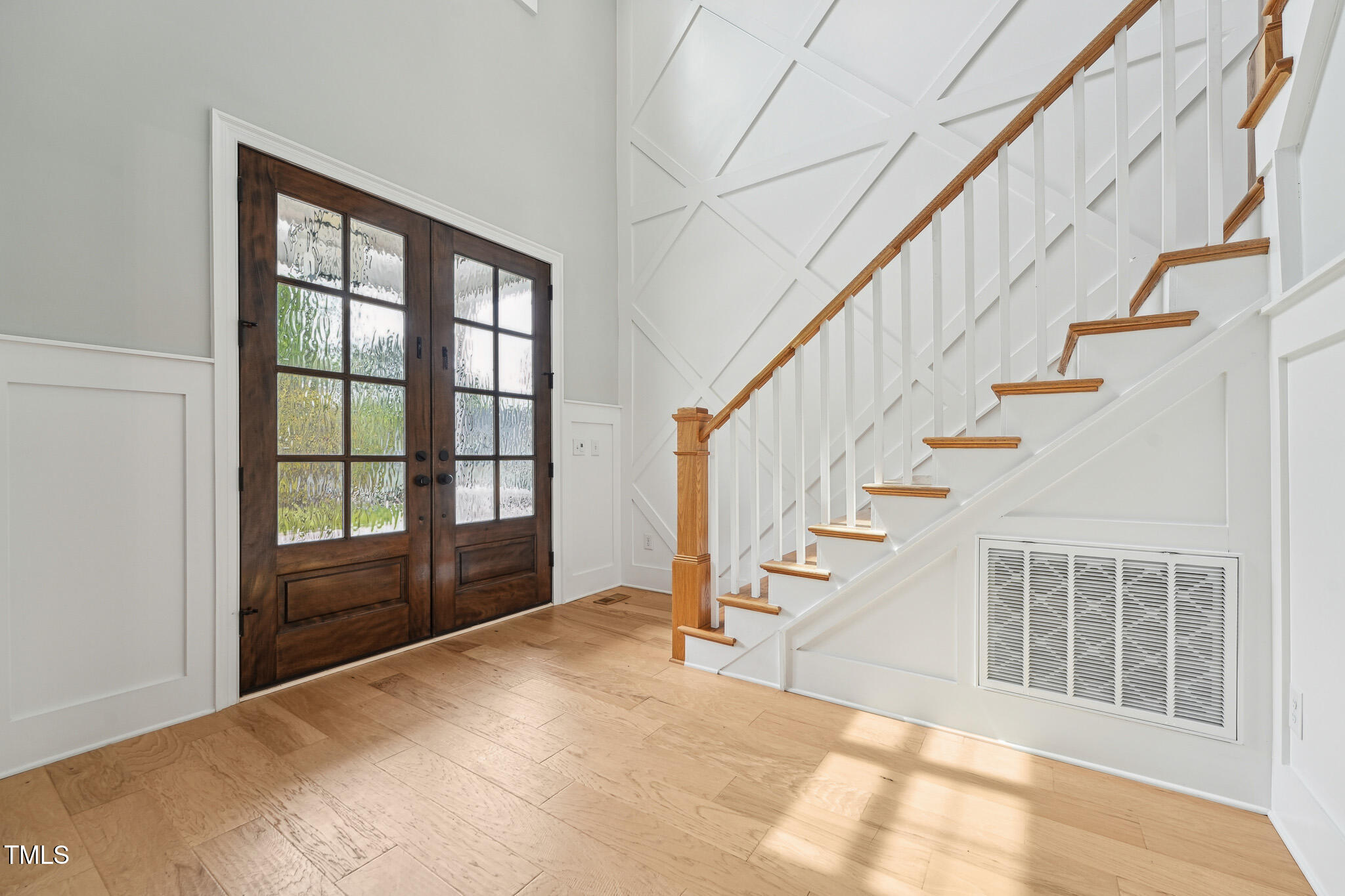 3545 Donlin Drive Wake Forest, NC 27587 - Photo 7 of 62 a view of entryway and hall with wooden floor