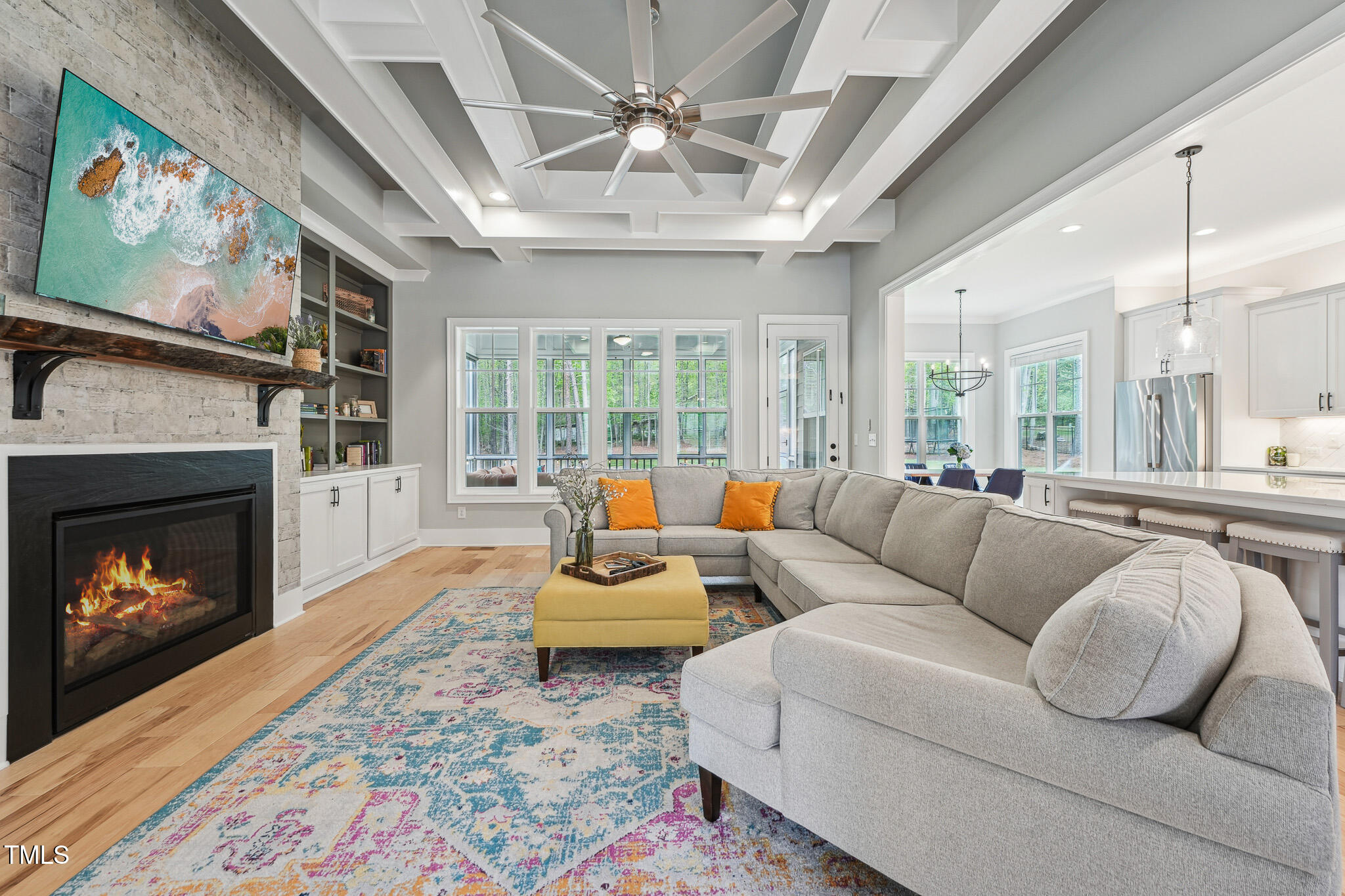 3545 Donlin Drive Wake Forest, NC 27587 - Photo 9 of 62 a living room with furniture fireplace and a large window
