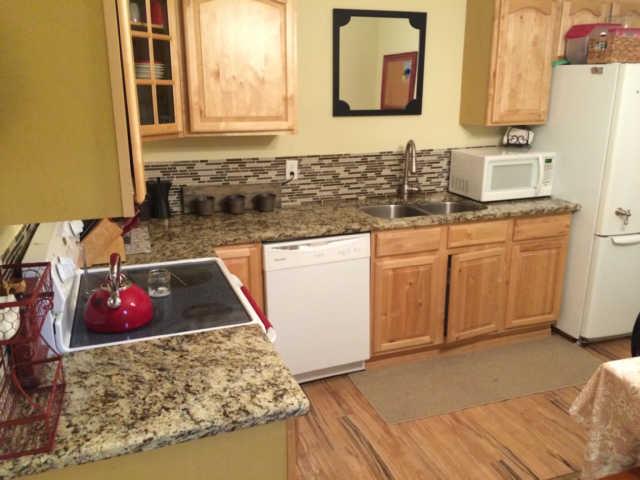 235 West Spring Street Lebanon, TN 37087 - Photo 14 of 20 Granite countertops! This kitchen has been completely redone. New cabinets, flooring, and still with that charming feel.