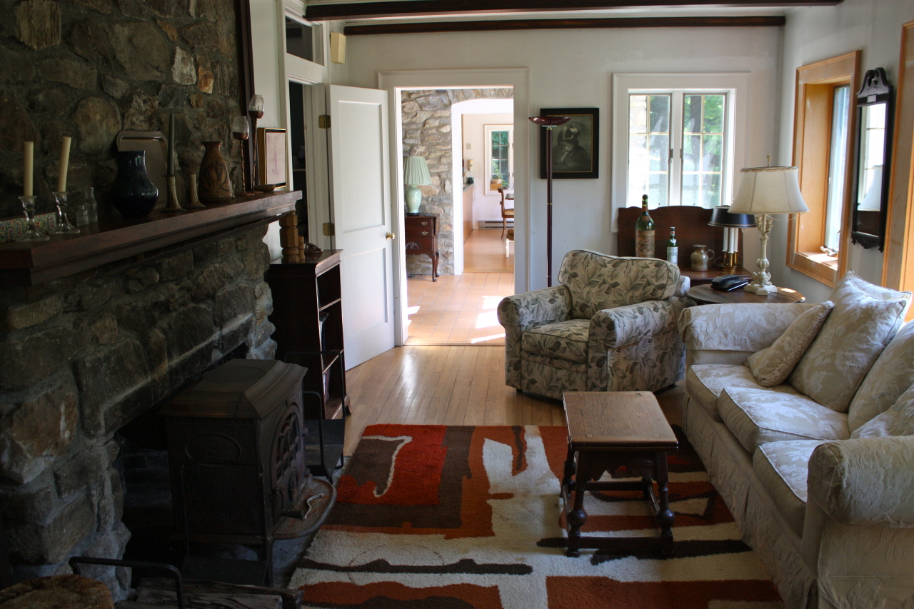 476 Main Road Monterey, MA 01245 - Photo 11 of 18 a living room with furniture and a flat screen tv