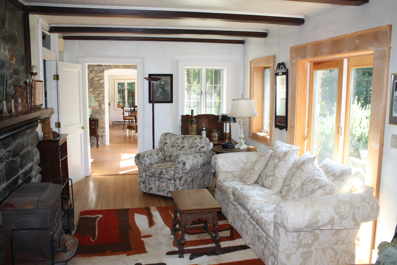 476 Main Road Monterey, MA 01245 - Photo 12 of 18 a living room with furniture and a fireplace