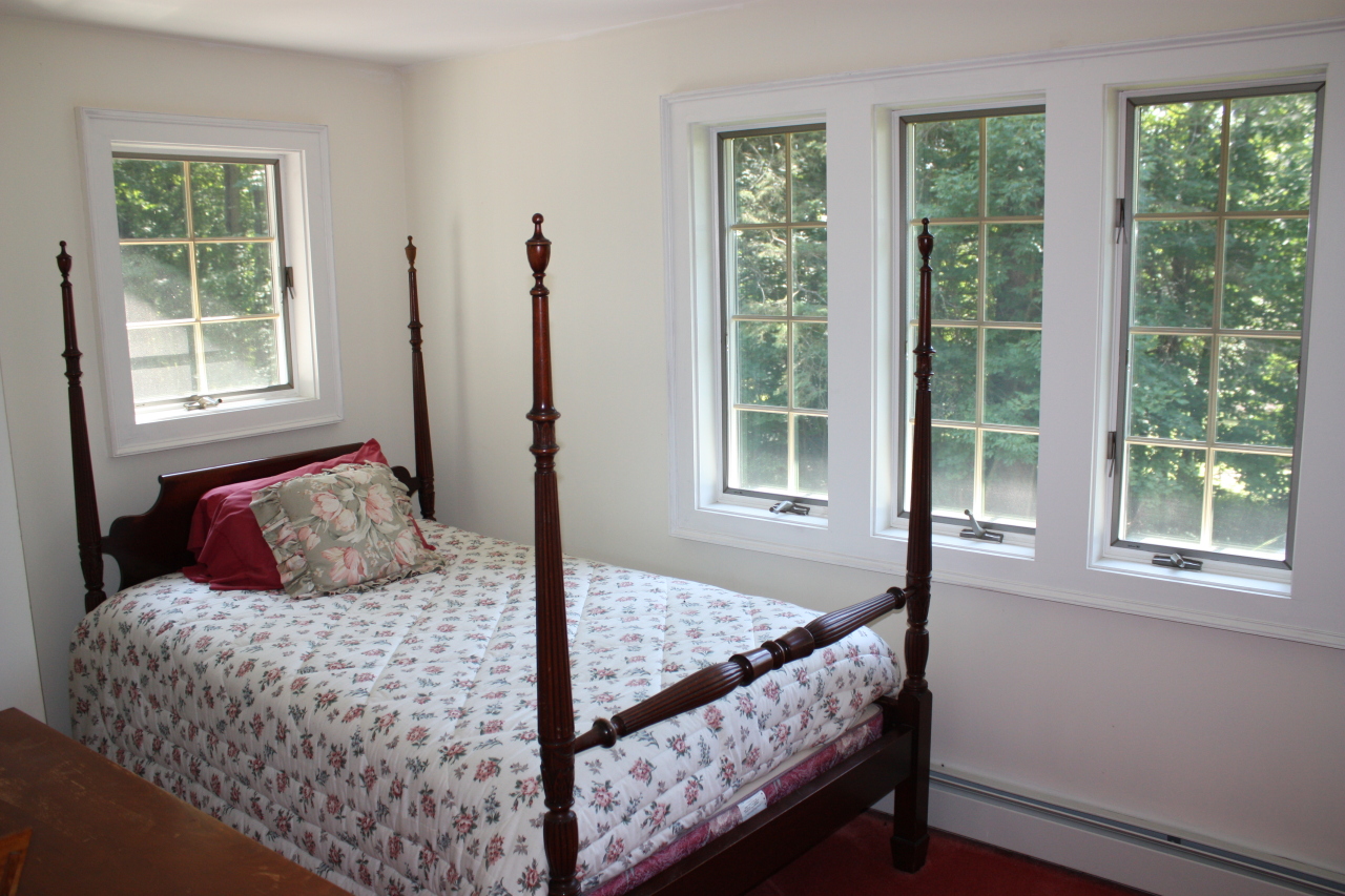 476 Main Road Monterey, MA 01245 - Photo 17 of 18 a bedroom with a bed and a window