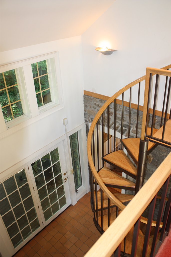 476 Main Road Monterey, MA 01245 - Photo 18 of 18 a view of an empty room with wooden floor and furniture