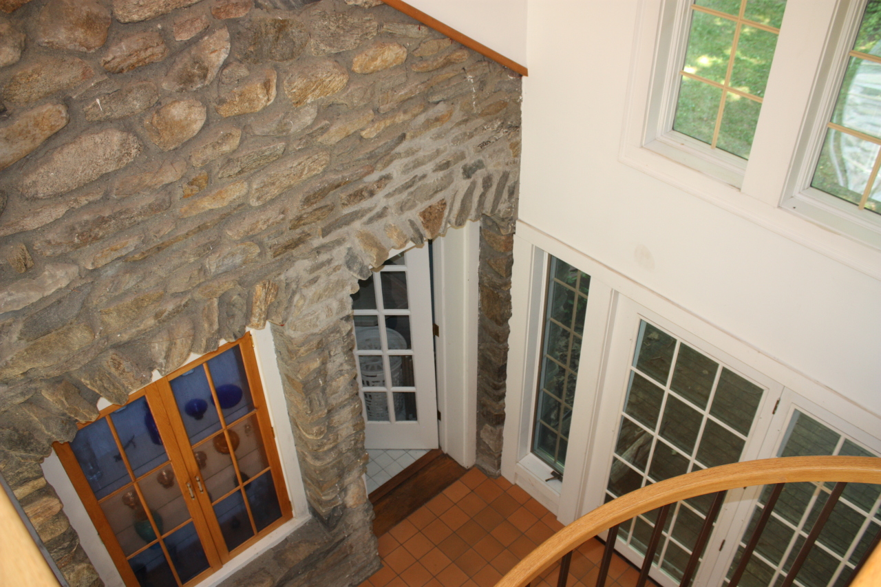 476 Main Road Monterey, MA 01245 - Photo 10 of 18 a view of an empty room with wooden floor and windows