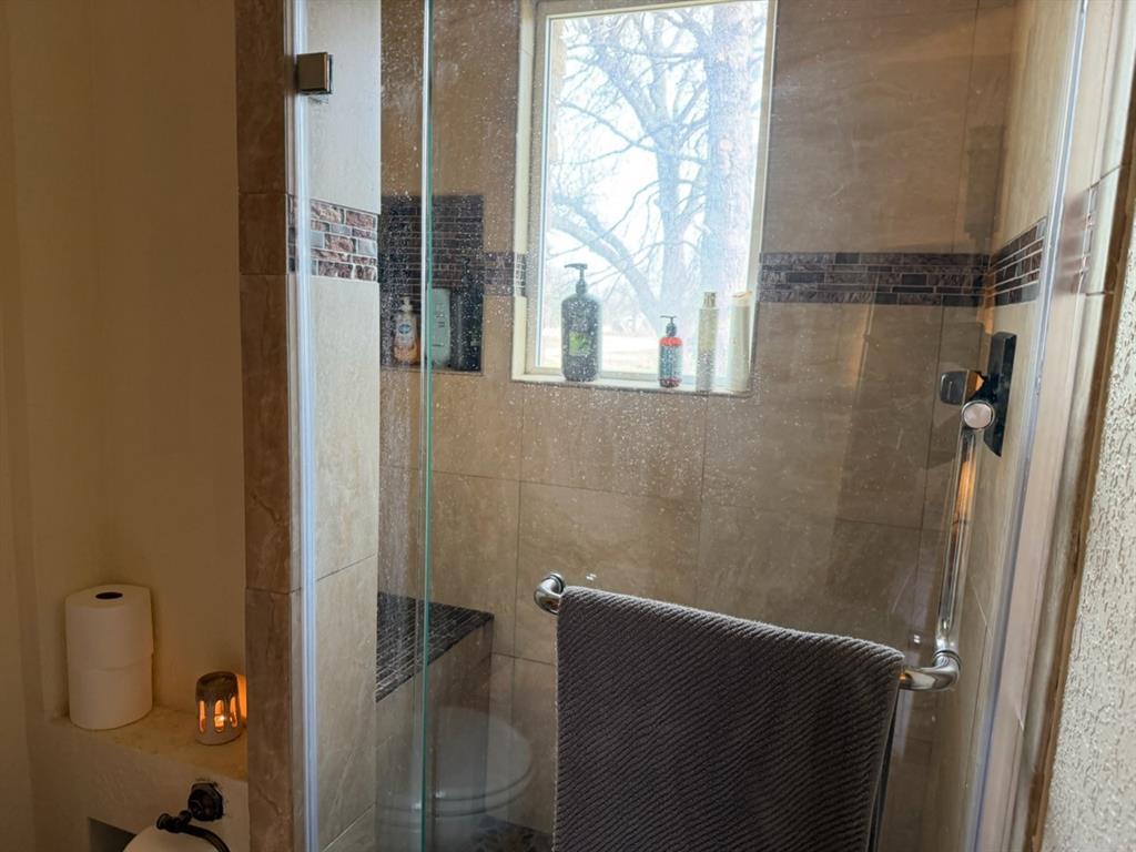 4050 Old Anson Road Abilene, TX 79601 - Photo 27 of 40 a bathroom with a shower