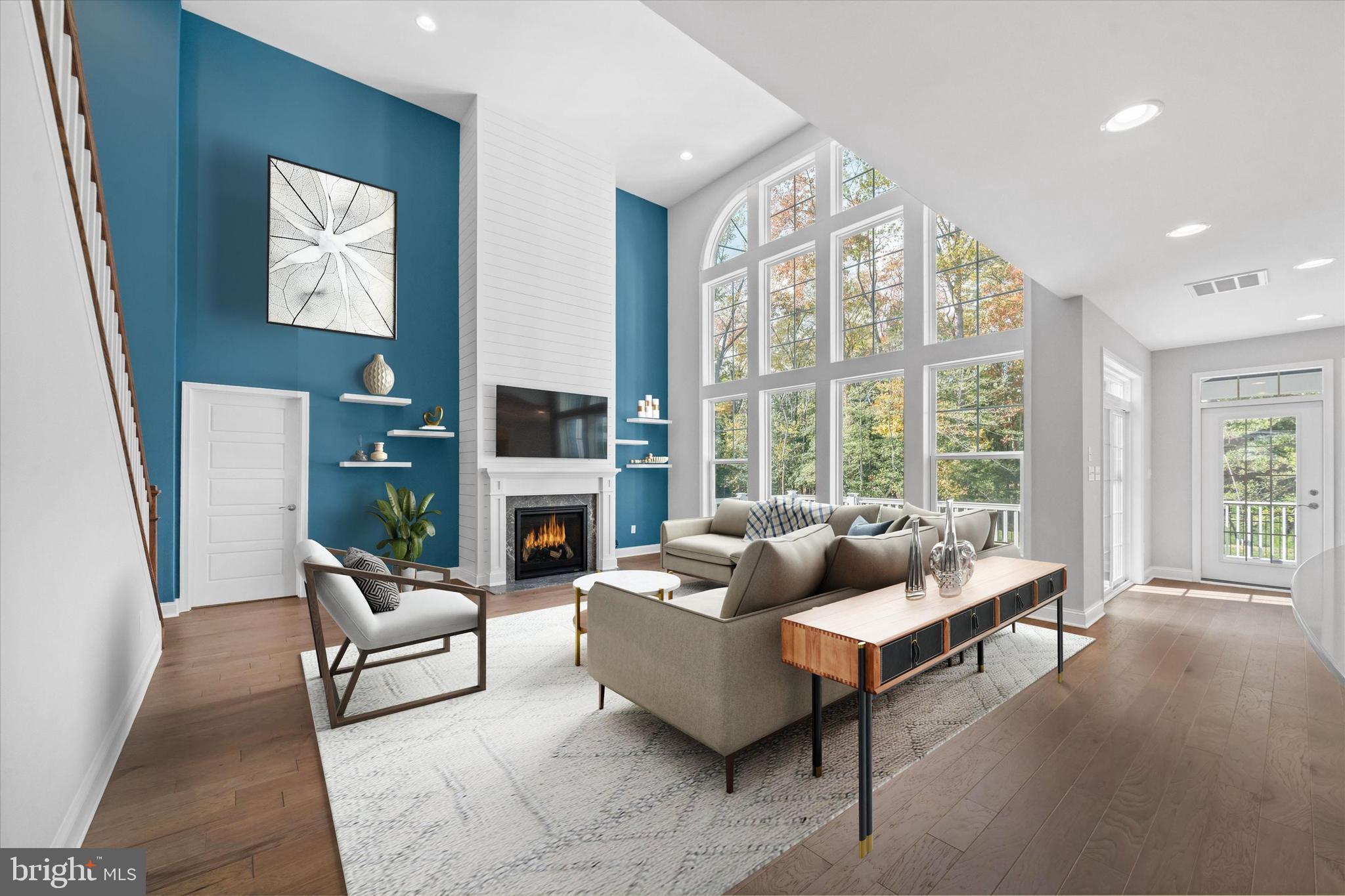 22144 Welches Way Lewes, DE 19958 - Photo 15 of 77 a living room with furniture and a large window