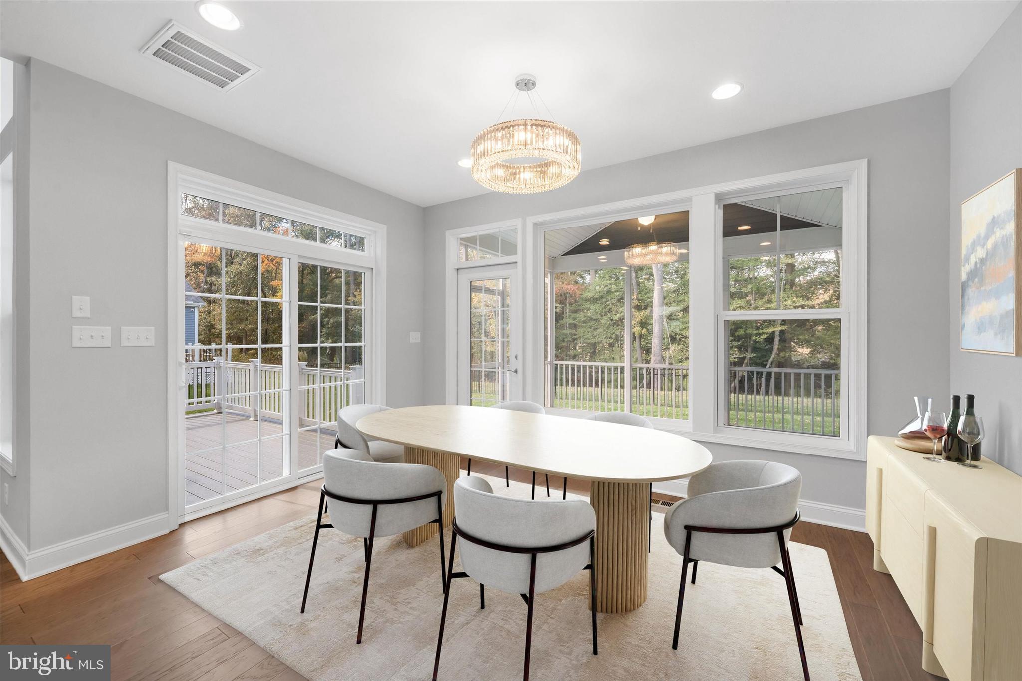 22144 Welches Way Lewes, DE 19958 - Photo 23 of 77 a dining room with furniture and a large window