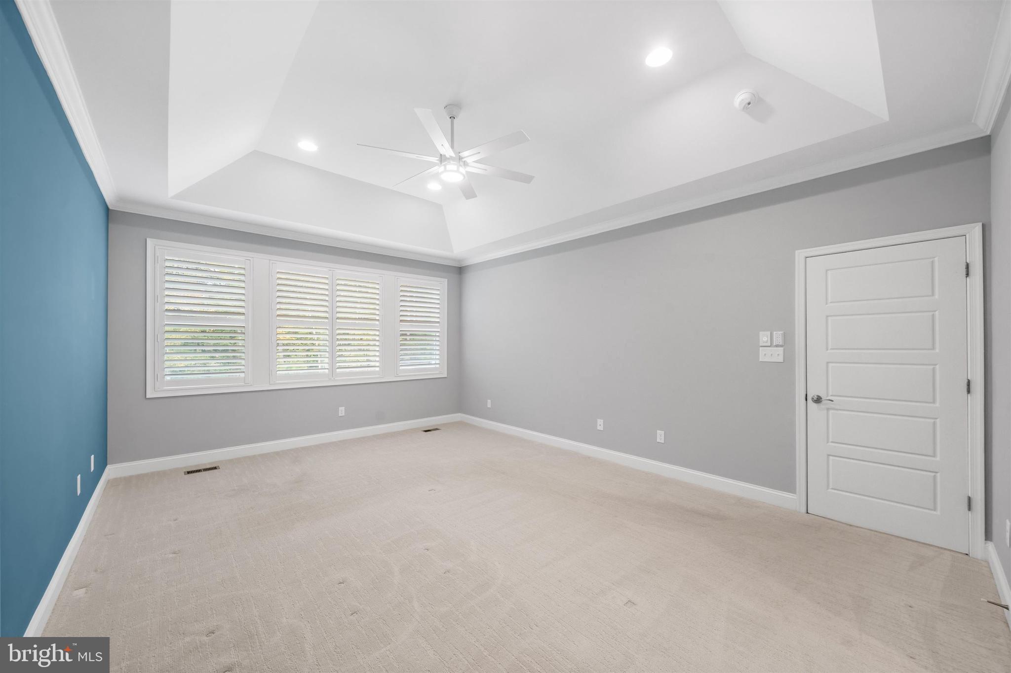 22144 Welches Way Lewes, DE 19958 - Photo 29 of 77 an empty room with windows and fan