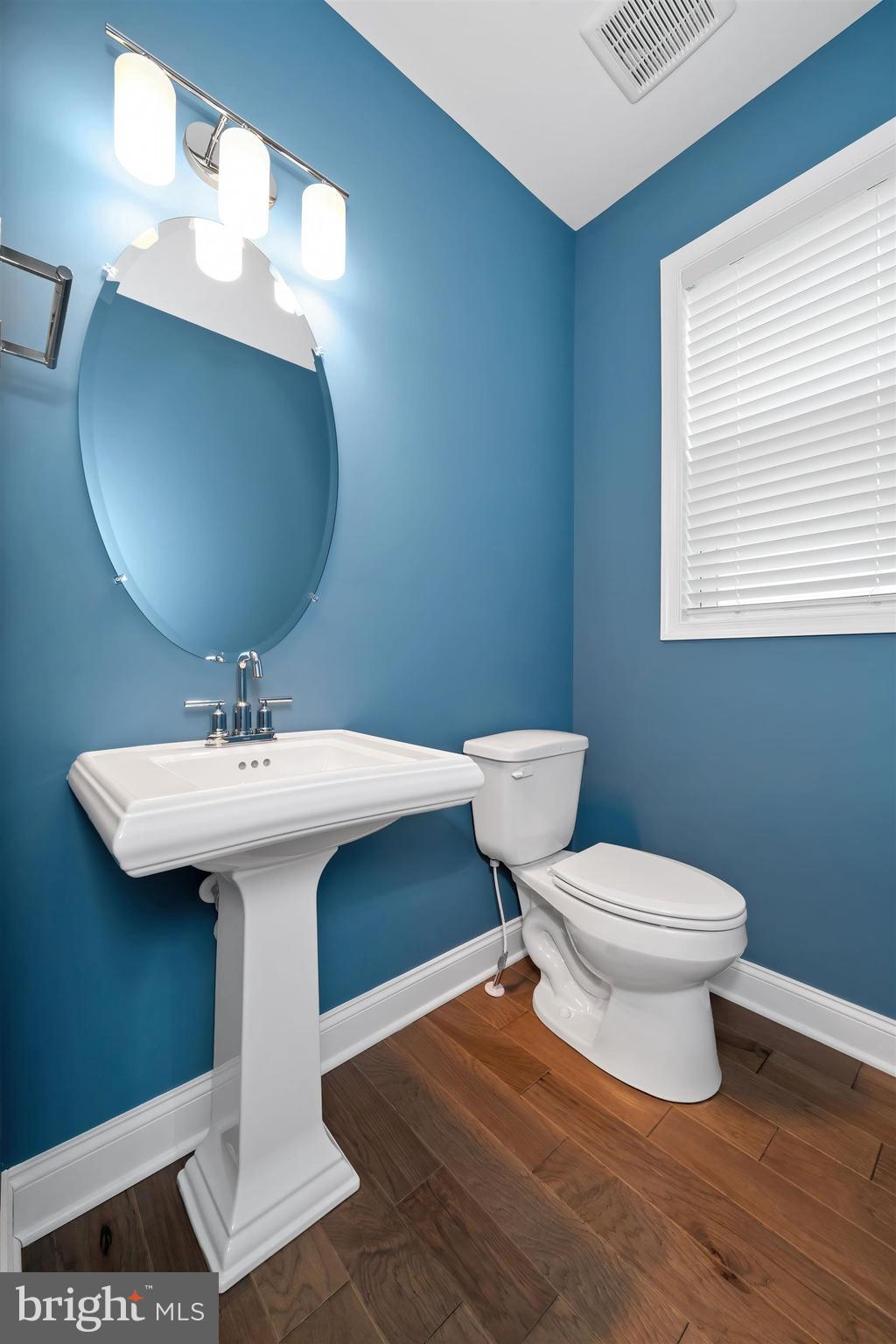 22144 Welches Way Lewes, DE 19958 - Photo 41 of 77 a bathroom with a sink toilet and a mirror