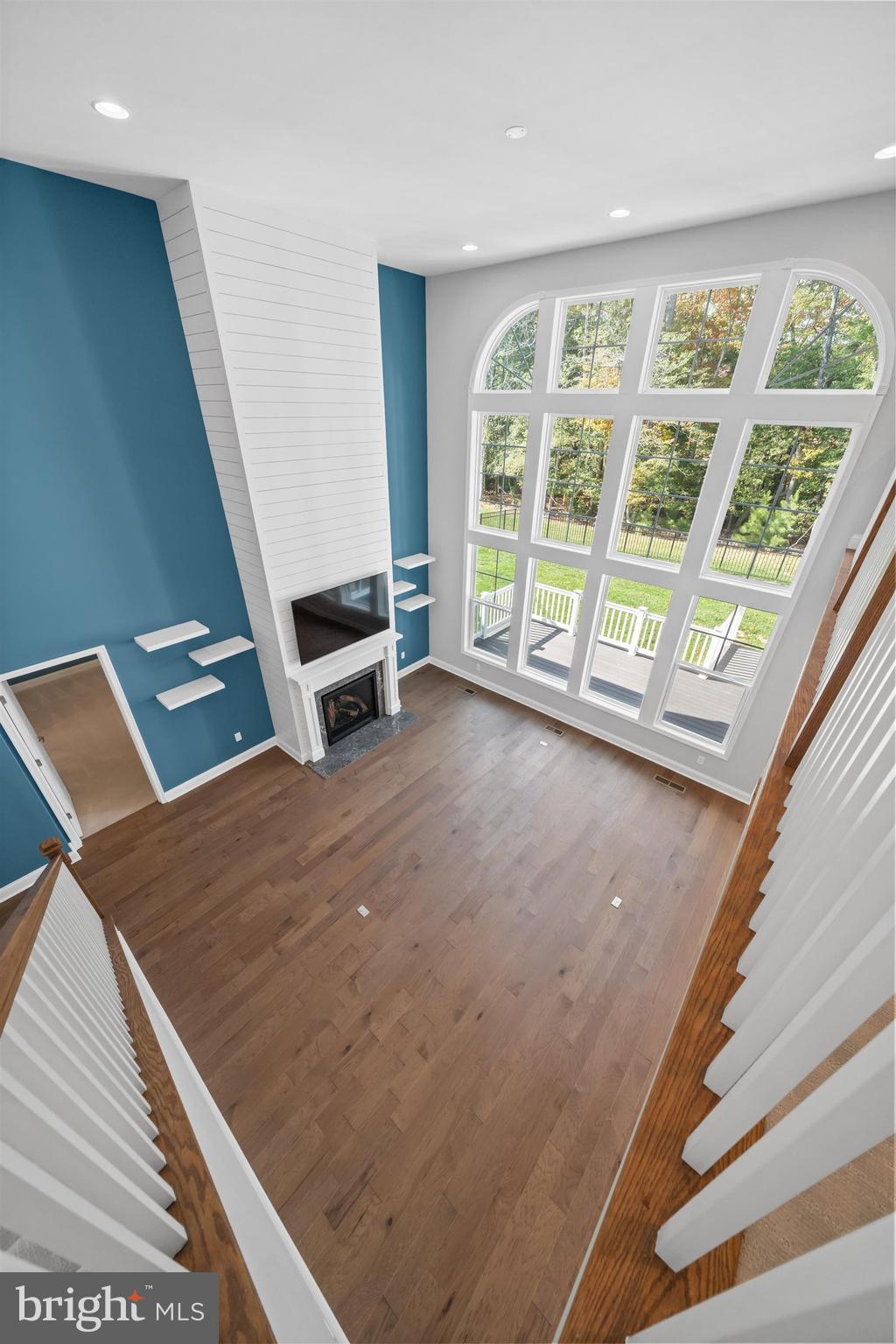 22144 Welches Way Lewes, DE 19958 - Photo 44 of 77 a view of a living room with furniture and a floor to ceiling window