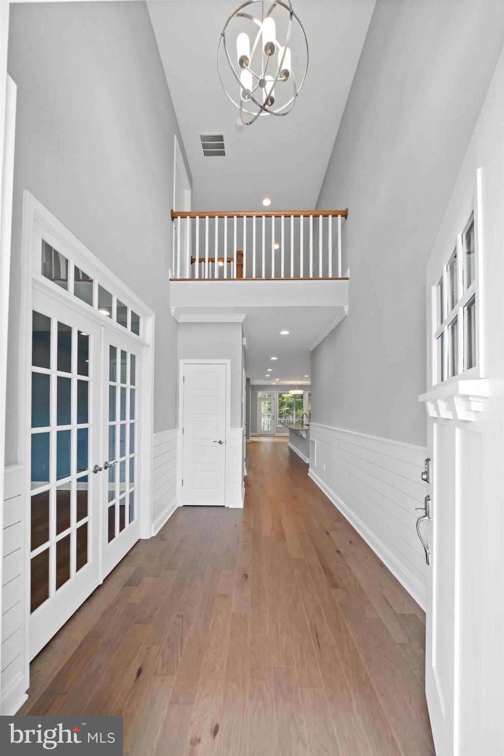 22144 Welches Way Lewes, DE 19958 - Photo 5 of 77 a view of an empty room with a window