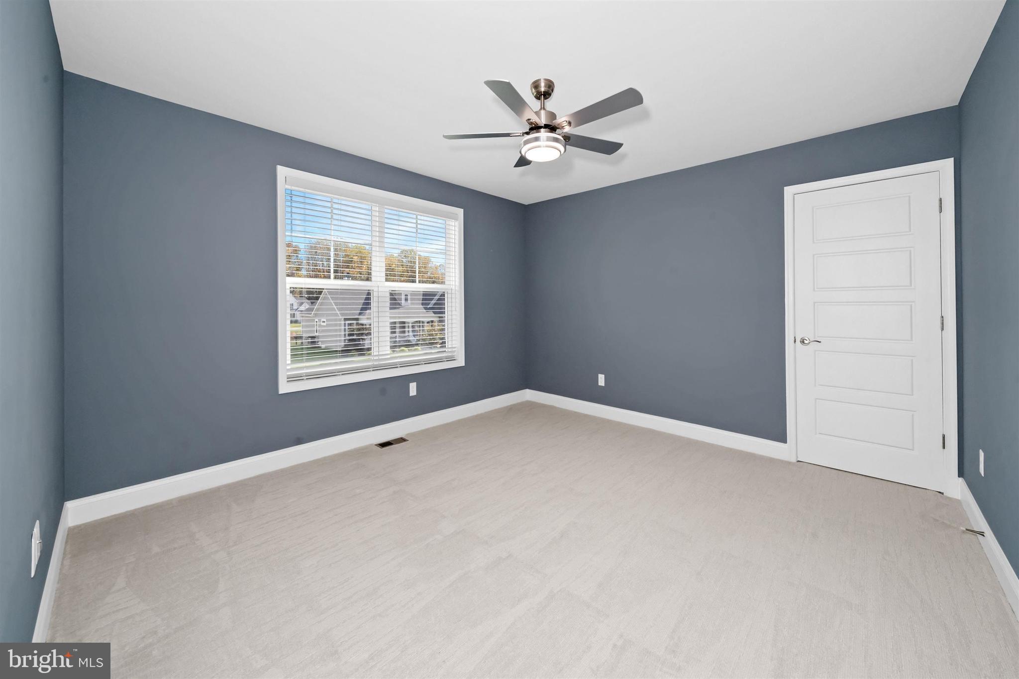 22144 Welches Way Lewes, DE 19958 - Photo 55 of 77 a view of an empty room with a window