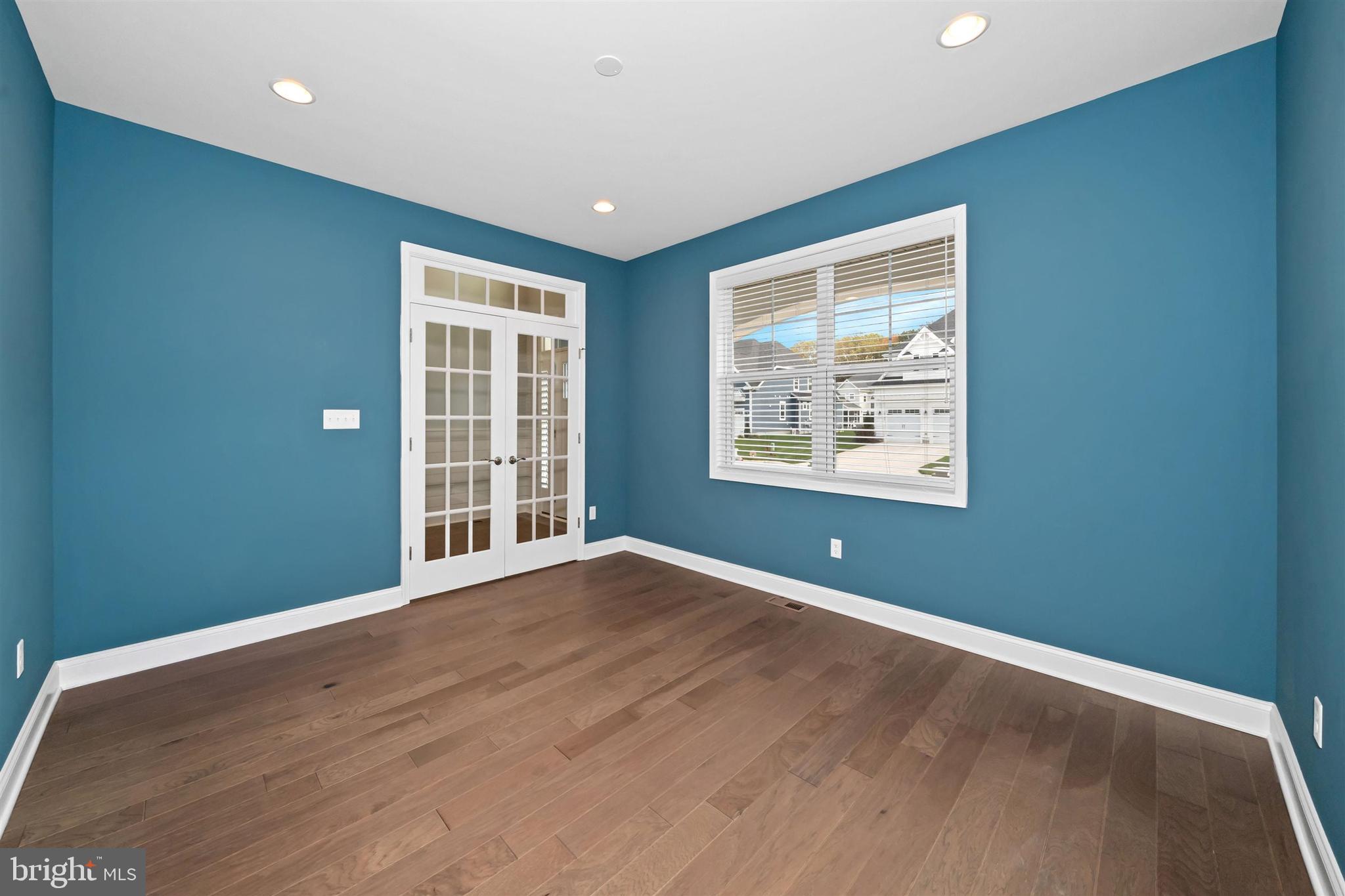 22144 Welches Way Lewes, DE 19958 - Photo 6 of 77 an empty room with windows