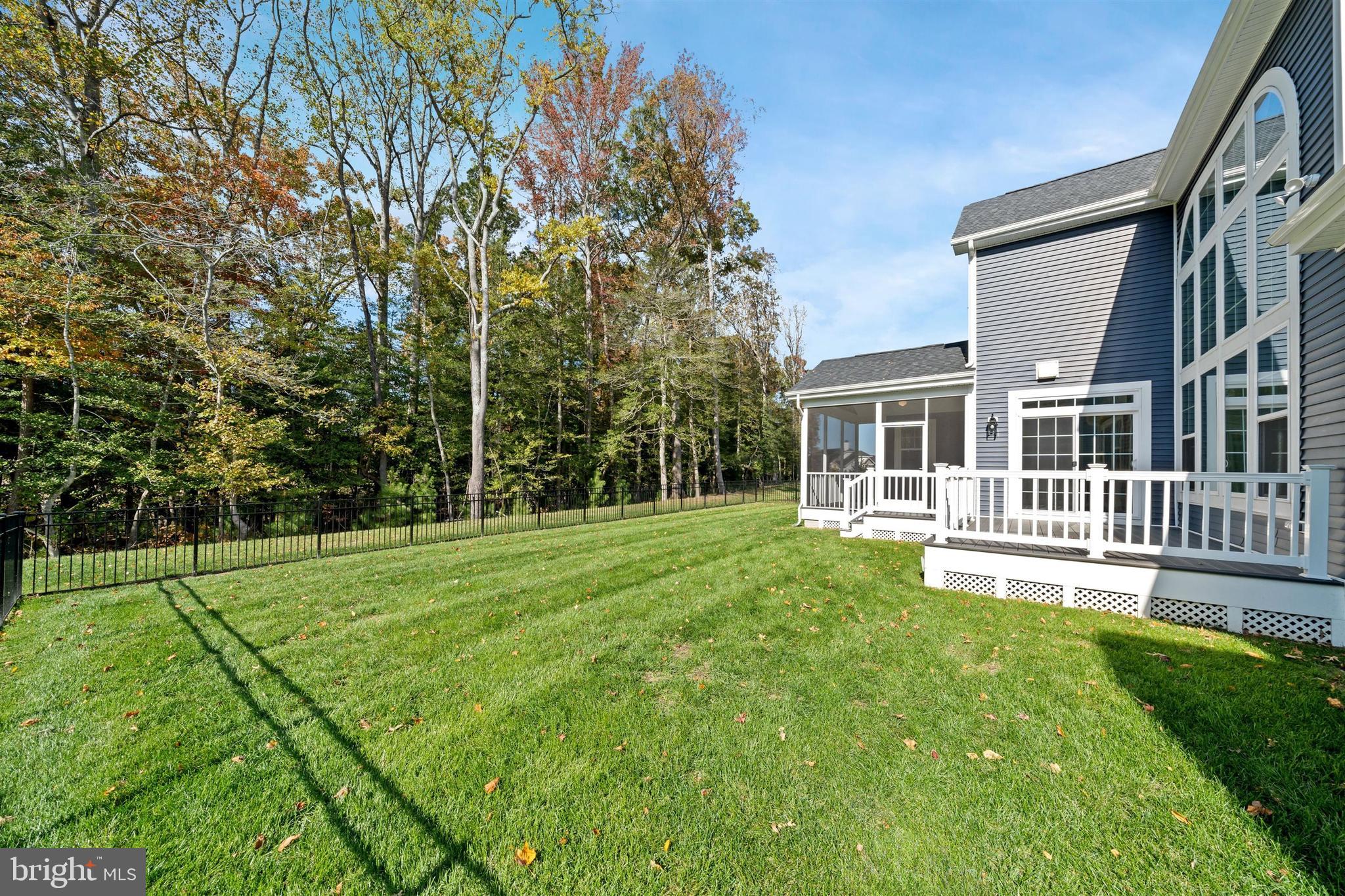 22144 Welches Way Lewes, DE 19958 - Photo 65 of 77 a view of a house with a yard and sitting area