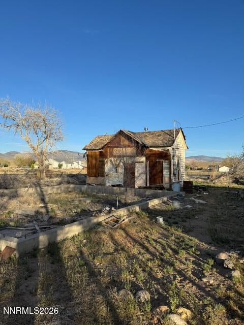 460 4th Street Wadsworth, NV 89442 - Photo 3 of 8 a view of a house with a yard